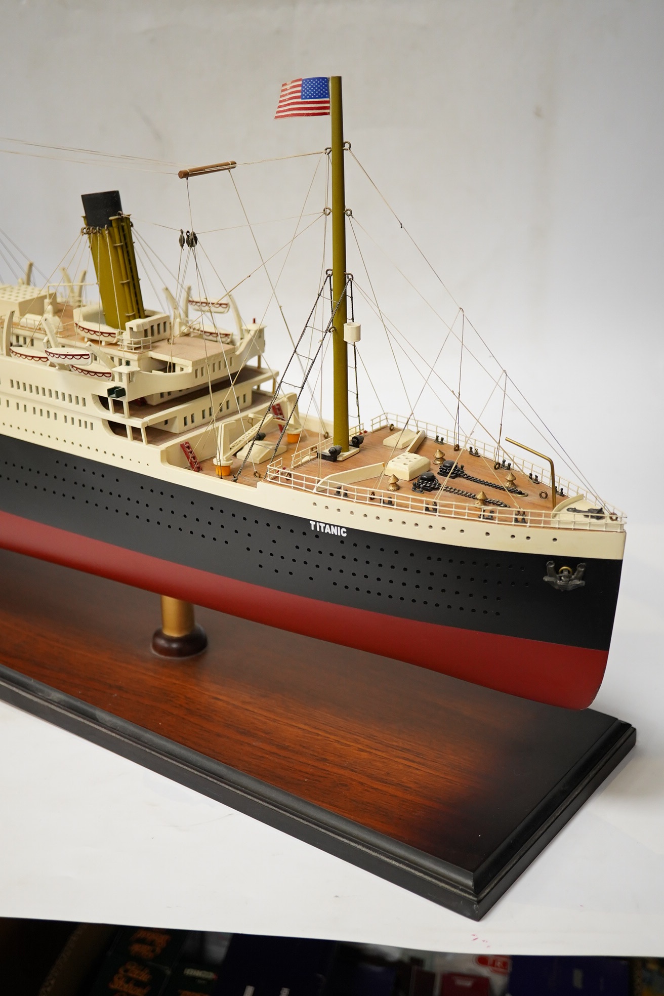 An 'Authentic Models' model of the ocean liner RMS Titanic, on stand, 100cm long. Condition - good.